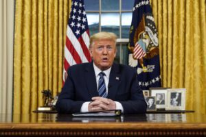 President Donald Trump speaks in an address to the nation from the Oval Office at the White House about the coronavirus Wednesday, March, 11, 2020, in Washington. (Doug Mills/The New York Times via AP, Pool)