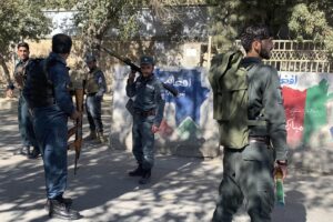 Afghan police arrive at the site of an attack at Kabul University in Kabul, Afghanistan, Monday, Nov. 2, 2020. Gunfire erupted at the university in the Afghan capital early Monday and police have surrounded the sprawling campus, authorities said. (AP Photo/Rahmat Gul)