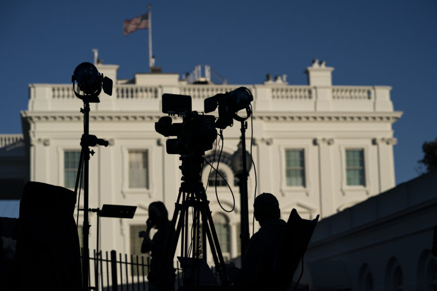 Journalists gather outside the White House, Wednesday, Nov. 4, 2020, in Washington. (AP Photo/Evan Vucci)