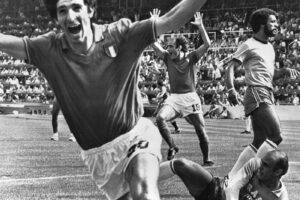 FILE – In this July 5, 1982 file photo, Italy’s Paolo Rossi, left, celebrates, after scoring the second goal for his team during their World Cup second round soccer match against Brazil, in Barcelona, Spain. Rossi died of Cancer, Dec. 10, 2020. He was 64. (AP Photo/File)