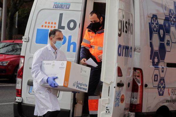 A box of some of the the first Pfizer coronavirus vaccines arrive at a nursing home in Madrid, Spain, Sunday Dec. 27. 2020. Spain plans to receive over 4.5 million doses of the vaccine over the next three months, enough it says to immunize just over 2.2 million people. The government estimates that this first phase will be enough to cover nursing home residents and workers, followed by health workers in general and people with disabilities. (AP Photo/Paul White)