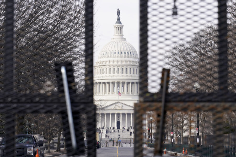 Security surrounds the U.S. Capitol in Washington, Friday, Jan. 15, 2021, ahead of the inauguration of President-elect Joe Biden and Vice President-elect Kamala Harris. (AP Photo/Susan Walsh)