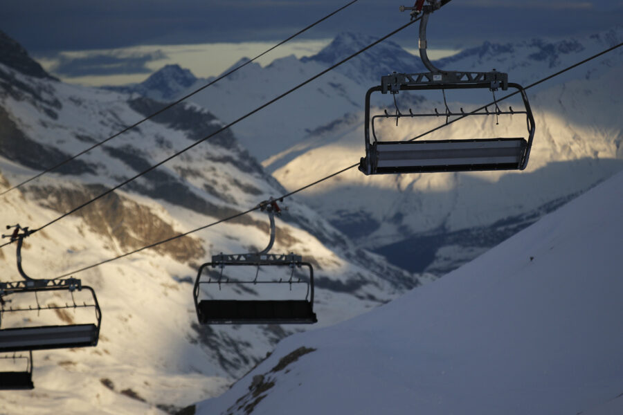 Chairlifts are stopped as several European countries have suspended access to the ski slopes to stop the spread of the COVID-19 pandemic, in the ski resort of Val d’Isere, France, Friday, Dec. 18, 2020. (AP Photo/Gabriele Facciotti)