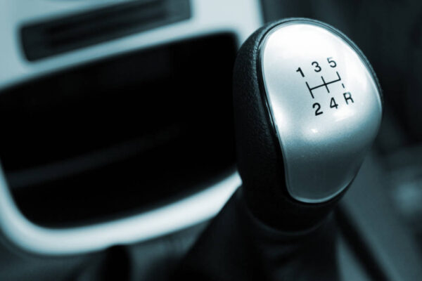 Gear shift handle in a modern car, closeup photo