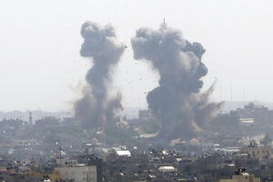 Smoke rises after an Israeli forces strike in Gaza in Gaza City, Tuesday, May 11, 2021. (AP Photo/Hatem Moussa)