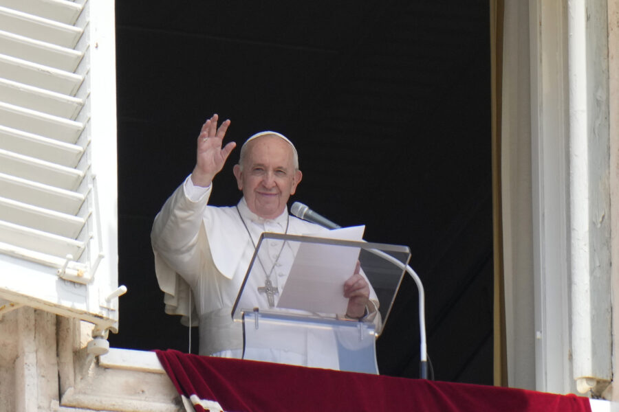 Pope Francis waves to the crowd as he arrives to recite the Angelus noon prayer from the window of his studio overlooking St.Peter’s Square, at the Vatican, Sunday, July 4, 2021. (AP Photo/Alessandra Tarantino)