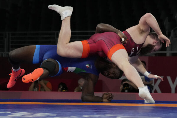 Canada’s Jordan Steen, right, competes against Italy’s Abraham de Jesus Conyedo Ruano during their men’s freestyle 97kg wrestling repechage match at the 2020 Summer Olympics, Saturday, Aug. 7, 2021, in Chiba, Japan. (AP Photo/Aaron Favila)