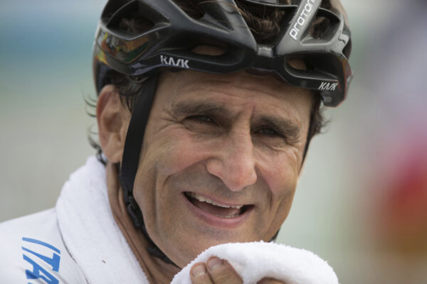 In this photo taken on Thursday, Sept. 15, 2016, Italy’s Alessandro "Alex" Zanardi, smiles after winning the silver medal in the men’s road race H5, during the 2016 Paralympics Games, in Rio de Janeiro, Brazil. Race car driver turned Paralympic champion Alex Zanardi has been seriously injured again. Police tell The Associated Press that Zanardi was transported by helicopter to a hospital in Siena following a road accident near the Tuscan town of Pienza during a national race for Paralympic athletes on handbikes. The 53-year-old Zanardi had both of his legs amputated following a horrific crash during a 2001 CART race in Germany. He was a two-time CART champion. (AP Photo/Mauro Pimentel)