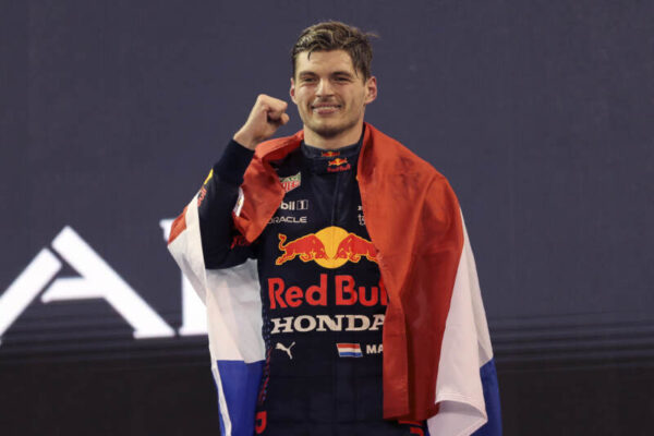 Red Bull driver Max Verstappen of the Netherlands celebrates after becoming F1 drivers world champion after winning the Formula One Abu Dhabi Grand Prix in Abu Dhabi, United Arab Emirates, Sunday, Dec. 12. 2021. (AP Photo/Kamran Jebreili, Pool)