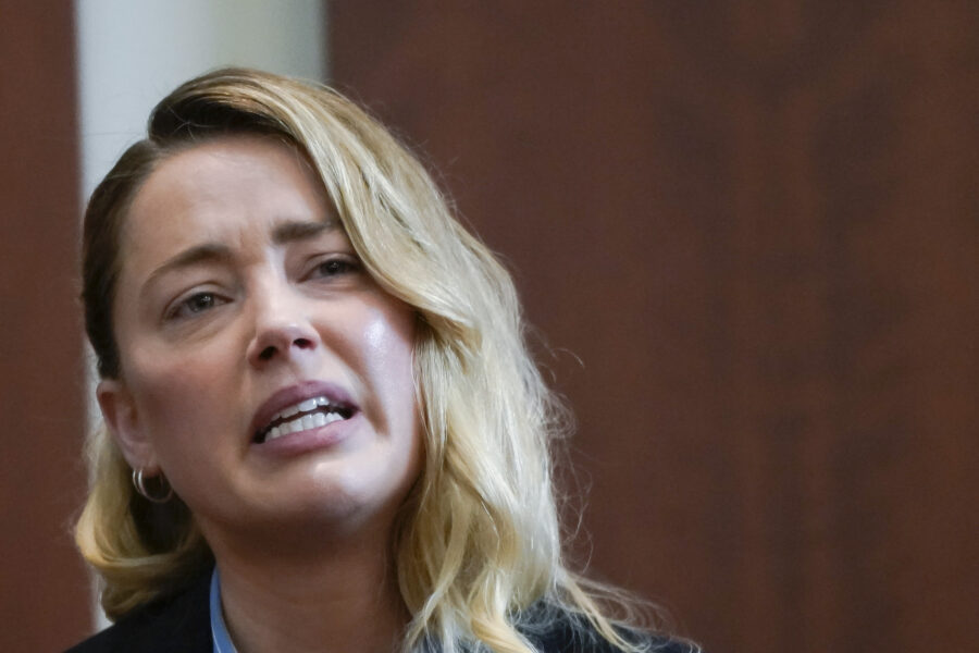 Actor Amber Heard testifies in the courtroom at the Fairfax County Circuit Court in Fairfax, Va., Wednesday May 4, 2022. Actor Johnny Depp sued his ex-wife Heard for libel in Fairfax County Circuit Court after she wrote an op-ed piece in The Washington Post in 2018 referring to herself as a "public figure representing domestic abuse." (Elizabeth Frantz/Pool Photo via AP)
Actor Amber Heard testifies in the courtroom at the Fairfax County Circuit Court in Fairfax, Va., Wednesday May 4, 2022. Actor Johnny Depp sued his ex-wife Heard for libel in Fairfax County Circuit Court after she wrote an op-ed piece in The Washington Post in 2018 referring to herself as a "public figure representing domestic abuse." (Elizabeth Frantz/Pool Photo via AP)
Actor Amber Heard testifies about the first time her ex-husband, actor Johnny Depp hit her, at Fairfax County Circuit Court during a defamation case against her by Depp in Fairfax, Virginia, U.S., May 4, 2022. REUTERS/Elizabeth Frantz/Pool