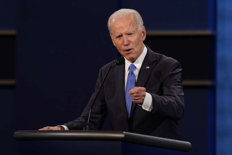 Democratic presidential candidate former Vice President Joe Biden gestures while speaking during the second and final presidential debate Thursday, Oct. 22, 2020, at Belmont University in Nashville, Tenn. (AP Photo/Patrick Semansky)