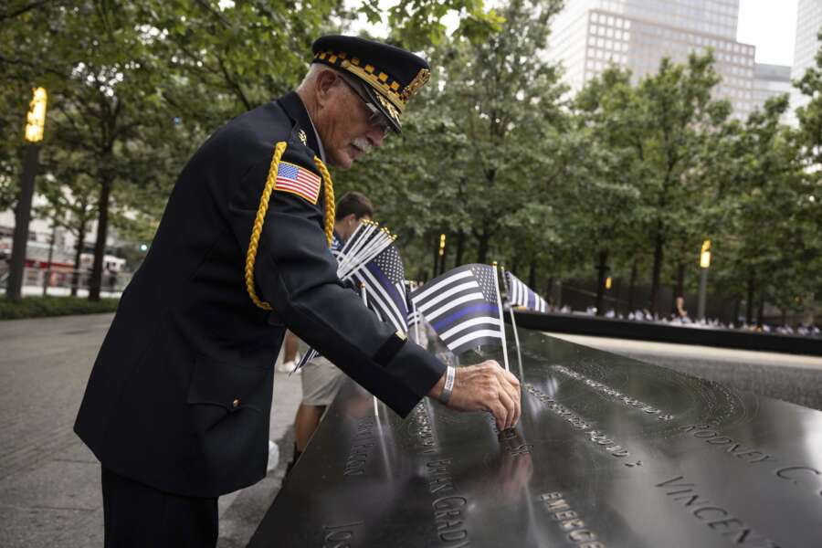 Sam Pulia places flags before the commemoration ceremony of the Sept. 11, 2001, terror attacks, Monday, Sept. 11, 2023, in New York. Americans are looking back on the horror and legacy of 9/11, gathering Monday at memorials, firehouses, city halls and elsewhere to observe the 22nd anniversary of the deadliest terror attack on U.S. soil. (AP Photo/Yuki Iwamura)


Associated Press/LaPresse
Only Italy and Spain