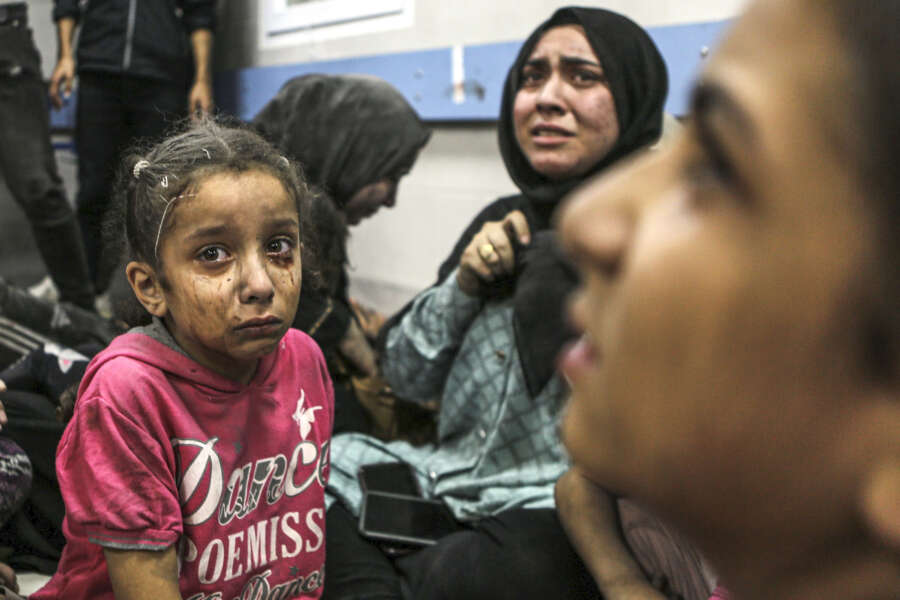 Wounded Palestinians at the al-Shifa hospital, following Israeli airstrikes, in Gaza City, central Gaza Strip, Tuesday, Oct. 17, 2023. (AP Photo/Abed Khaled)