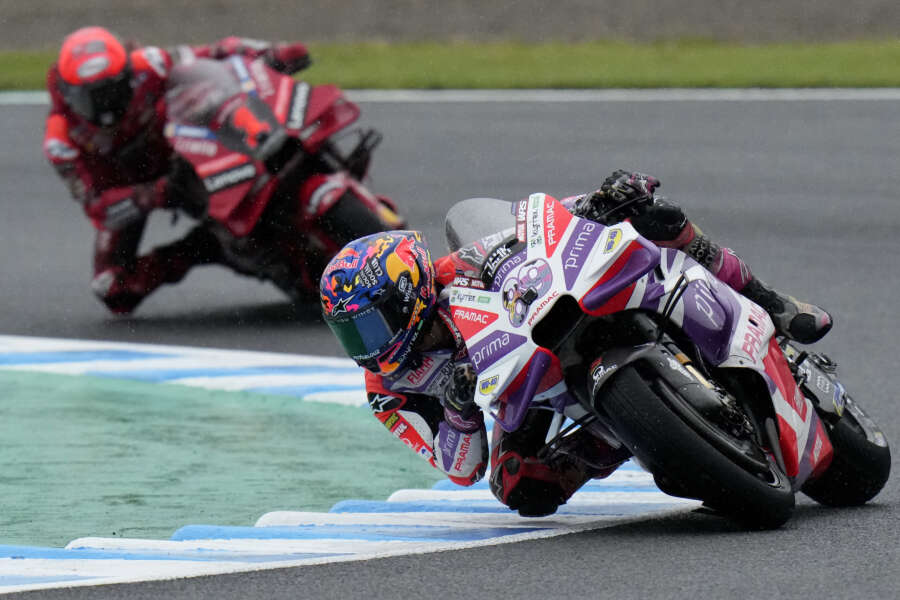 Spain’s Jorge Martin, front, steers his motorcycle, chased by Italy’s Francesco Bagnaia, on his way to winning the MotoGP race of Japanese Motorcycle Grand Prix at the Twin Ring Motegi circuit in Motegi, north of Tokyo Sunday, Oct. 1, 2023.(AP Photo/Shuji Kajiyama)