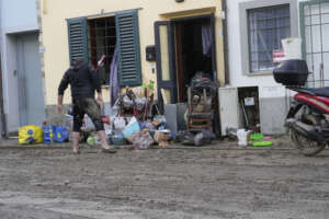 A man stands by mud covered belongings in front of his house in Campi di Bisenzio, in the central Italian Tuscany region, Friday, Nov. 3, 2023. Record-breaking rain provoked floods in a vast swath of Tuscany as storm Ciaran pushed into Italy overnight Friday, trapping people in their homes, inundating hospitals and overturning cars. At least three people were killed, and four were missing. (AP Photo/Gregorio Borgia) 


Associated Press / LaPresse
Only italy and Spain