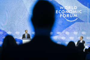 Isaac Herzog, President of the State of Israel, left, delivers a speech next to Borge Brende, President, World Economic Forum, right, at the 51st annual meeting of the World Economic Forum, WEF, in Davos, Switzerland, on Wednesday, May 25, 2022. The forum has been postponed due to the Covid-19 outbreak and was rescheduled to early summer. The meeting brings together entrepreneurs, scientists, corporate and political leaders in Davos under the topic “History at a Turning Point: Government Policies and Business Strategies” from 22 – 26 May 2022. (Gian Ehrenzeller/Keystone via AP)