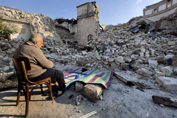 Turkish citizen Mehmet Ismet, prays in front the rubble of the historic Habib Najjar mosque which destroyed during the devastated earthquake, in the old city of Antakya, Turkey, Saturday, Feb. 11, 2023. A story in the Quran relates how three messengers from God came to an unnamed town, urging its sinful people to follow His word. They refused, and God destroyed the city with a mighty blast. Many traditions say the town was the ancient city of Antioch – the modern Turkish city of Antakya. (AP Photo/Hussein Malla)

Associated Press/LaPresse
Only Italy and Spain