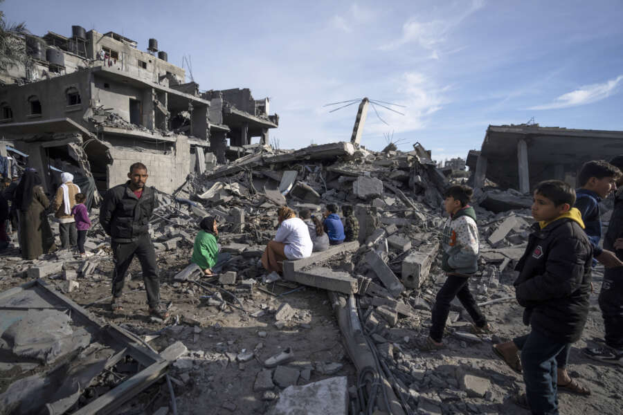 Palestinians inspect the damage to residential buildings where two Israeli hostages were reportedly held before being rescued during an operation by Israeli security forces in Rafah, southern Gaza Strip, Monday, Feb. 12, 2024. The Israeli military said early Monday that it had rescued the two hostages from captivity in the Gaza Strip. The operation, which was accompanied by airstrikes, killed dozens of Palestinians, according to local health officials. (AP Photo/Fatima Shbair) 



Assocuated Press / LaPresse
Only italy and Spain