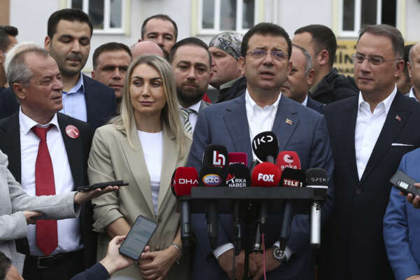 Ekrem Imamoglu, the Mayor of Istanbul Metropolitan Municipality, speaks outside a polling station, in Istanbul, Turkey, Sunday, May 28, 2023. Voters in Turkey returned to the polls Sunday to decide whether the country’s longtime leader stretches his increasingly authoritarian rule into a third decade, or is unseated by a challenger who has promised to restore a more democratic society. (DIA Images via AP)