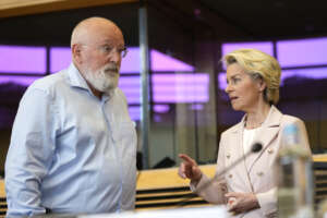 European Commission President Ursula von der Leyen, right, speaks with European Commissioner for European Green Deal Frans Timmermans during the weekly College of Commissioners meeting at EU headquarters in Brussels on Wednesday, July 20, 2022. European Union Commissioners started to put the finishing touches early Wednesday on a drastic plan to make sure that any Russian cut off of its vast natural gas supplies to the bloc will not disrupt industries and send an additional chill through homes next winter. (AP Photo/Virginia Mayo)