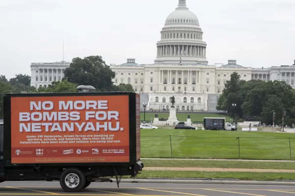 IMAGE DISTRIBUTED FOR OXFAM AMERICA – A No More Bombs for Netanyahu mobile billboard is seen near the Capitol building on Tuesday, July 23, 2024 in Washington. Oxfam America, Win Without War, American Friends of Combatants for Peace, Indivisible, Middle East Democracy Center and SEIU, sponsor a mobile billboard with the message NO MORE BOMBS FOR NETENYAHU to circle the US Capitol before Israeli Prime Minister Benjamin Netanyahu speaks on Wednesday to a joint session of Congress. (Kevin Wolf/AP Content Services for Oxfam America)