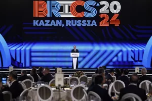 Russian President Vladimir Putin speaks at festive reception of the BRICS Summit in Kazan, Russia, Wednesday, Oct. 23, 2024. (Alexander Nemenov, Pool Photo via AP)