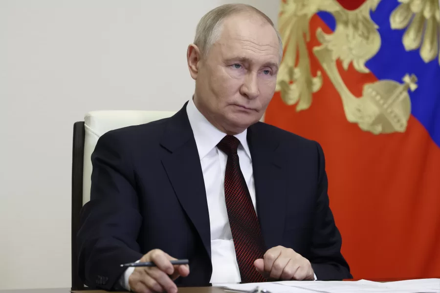 Russian President Vladimir Putin attends a ceremony to open social infrastructure facilities in Russia’s new constituent entities via videoconference at the Novo-Ogaryovo state residence, outside Moscow, Russia, Monday, Sept. 30, 2024. (Mikhail Metzel, Sputnik, Kremlin Pool Photo via AP)