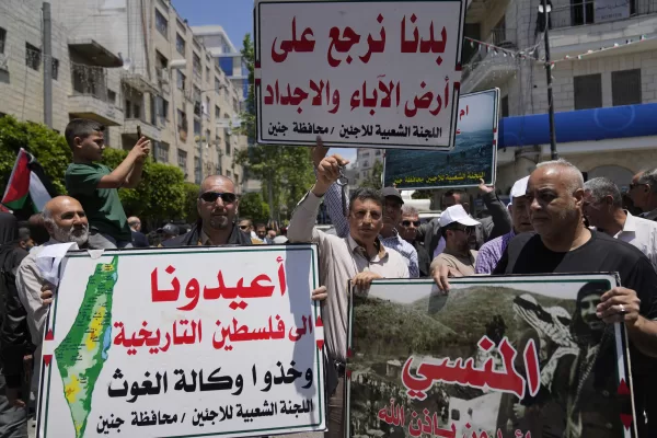 Palestinians carry posters that read in Arabic “we want to return to the land of our ancestors, return us to the historical Palestine and take the UNRWA,” during a mass ceremony to commemorate the Nakba Day, Arabic for catastrophe, in the West Bank city of Ramallah, Wednesday, May 15, 2024. Palestinians are marking 76 years of dispossession on Wednesday, commemorating their mass expulsion from what is today Israel, as a potentially even larger catastrophe unfolds in Gaza, where more than half a million of people have been displaced in recent days by fighting. (AP Photo/Nasser Nasser) 


Associated Press / LaPresse
Only italy and Spain