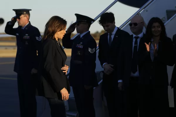 Democratic presidential nominee Vice President Kamala Harris walks to board Air Force Two at Philadelphia International Airport in Philadelphia, Sunday, Oct. 27, 2024, after spending the day campaigning in the city. (AP Photo/Susan Walsh)