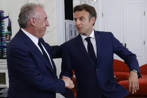 French President Emmanuel Macron, right, meets French centrist party MoDem (Mouvement Democrate) leader Francois Bayrou at the Elysee Palace in Paris, France, Tuesday, June 21, 2022. French President Emmanuel Macron was holding talks Tuesday with France’s main party leaders after his centrist alliance failed to win an absolute majority in parliamentary elections. (Ludovic Marin/Pool photo via AP)